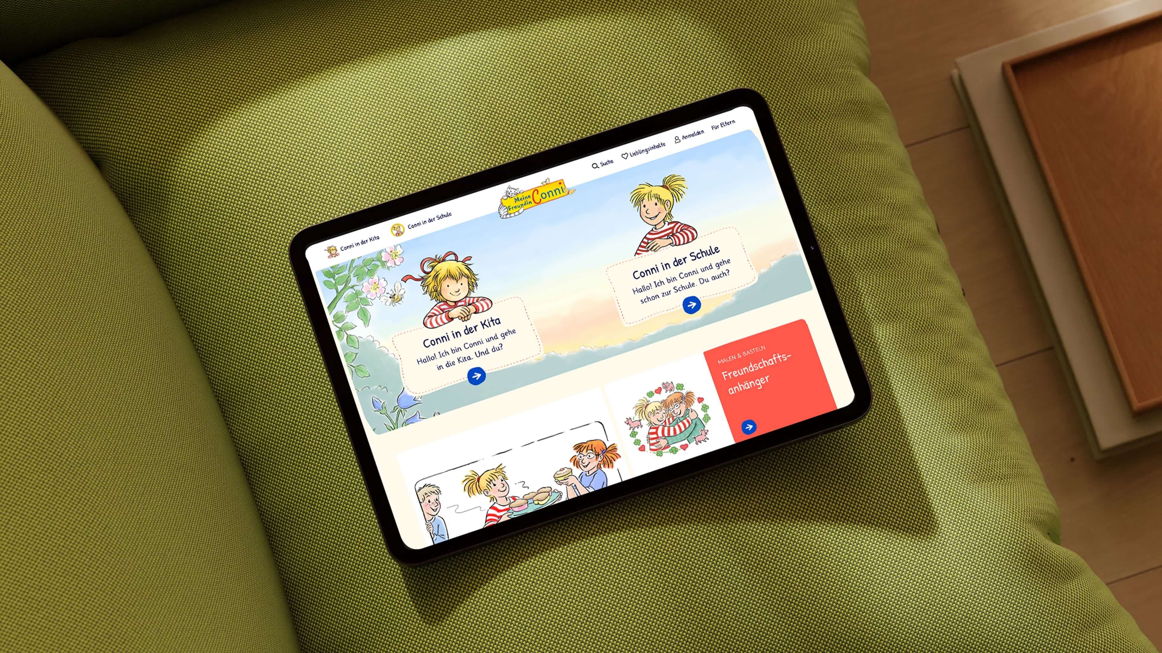A tablet displaying the website conni.de