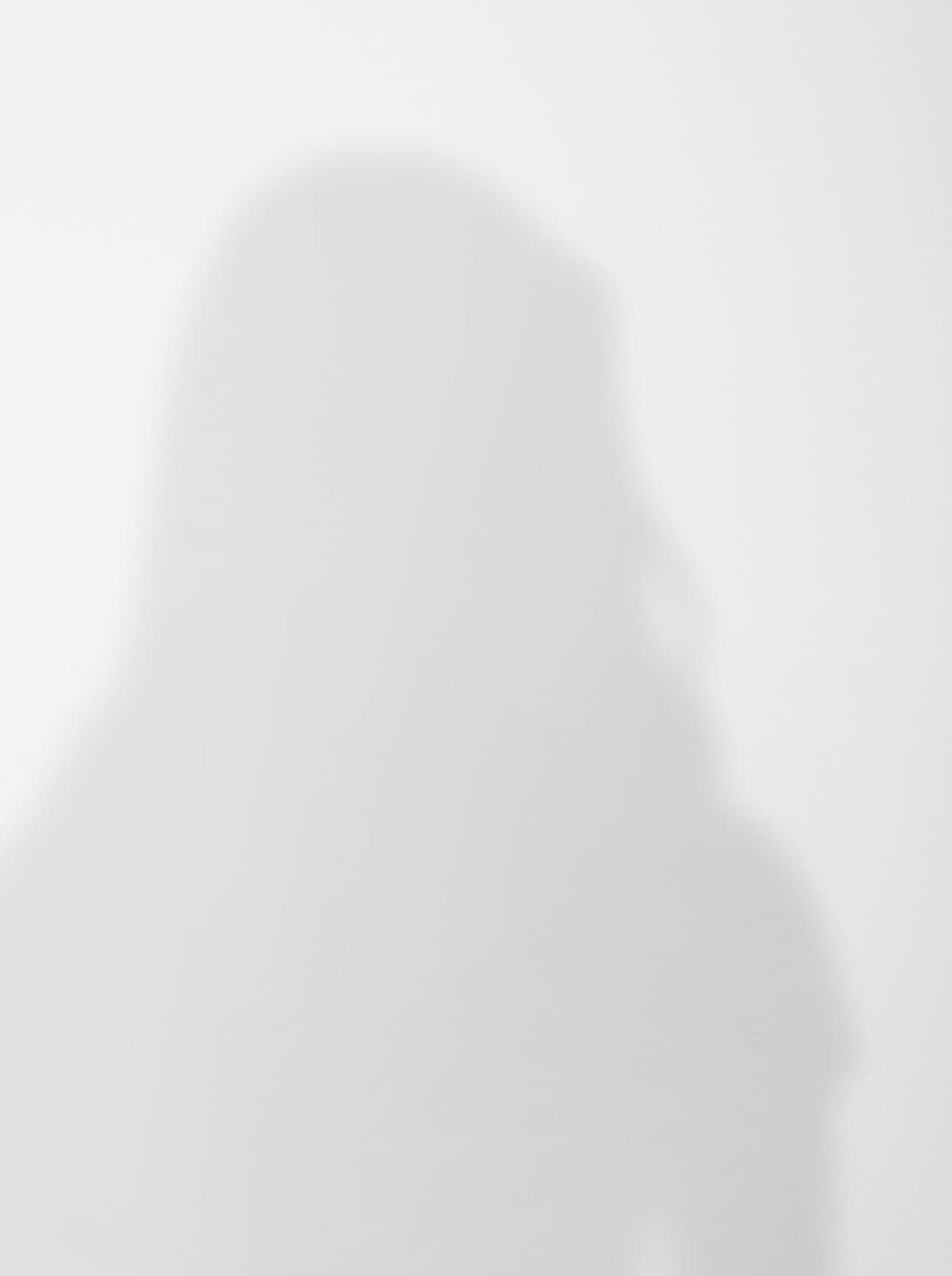 Schattenbild von einer weiblich gelesenen Person