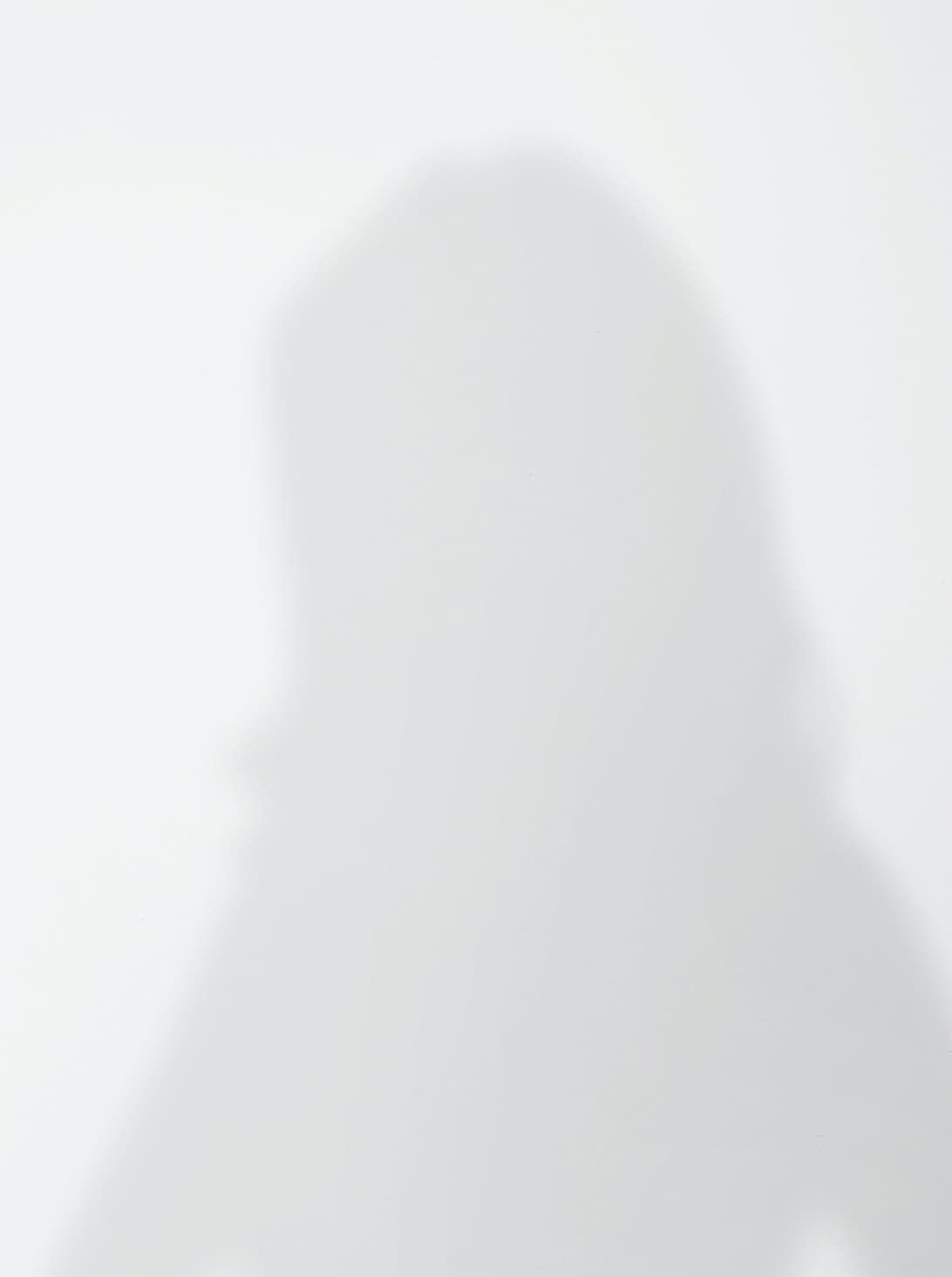 Schattenbild von einer weiblich gelesenen Person